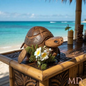 May include: A handcrafted wooden turtle sculpture with a detailed shell and lifelike features. The turtle is adorned with white and yellow flowers and greenery, set against a tropical beach backdrop. The sculpture is displayed on a bamboo bar.