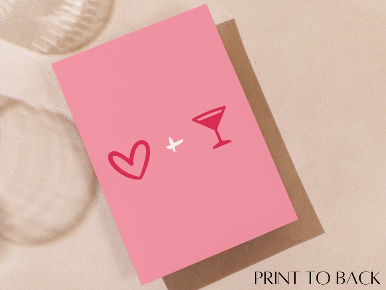May include: Pink card with a red heart and a red cocktail glass with a white line. The text "+" is between the heart and the glass.