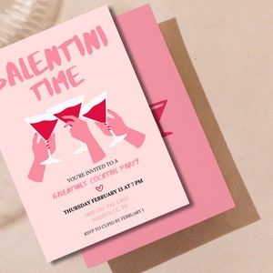 May include: Pink invitation card with the text "Galentini Time" in black lettering. The card features a graphic of three hands holding up pink martini glasses. The text below the graphic reads "You're invited to a Galentines Cocktail Party" with a pink heart symbol. The date, time, and location of the party are listed below the text.