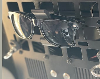 Soporte universal para gafas de sol en el coche: accesorio con clip para la visera para guardar gafas en vehículos.