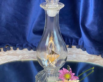 Vintage AVON Sea Fantasy Glass Perfume Bottle with Gold Fish and Glass Shell Stopper