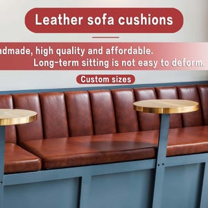 May include: A brown leather sofa with a blue frame and two small round tables with gold-colored tops. The text on the image says "Leather sofa cushions", "Handmade, high quality and affordable", "Long-term sitting is not easy to deform", and "Custom sizes".