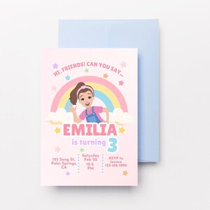 Pastel-themed birthday invitation featuring a cartoon girl inspired by Ms. Rachel, waving with a cheerful expression. The design includes a rainbow, clouds, and colorful stars on a light pink background. The text reads, 'Hi, friends! Can you say…' followed by 'Emilia is turning 3' in bold pink and purple letters. Below, event details such as date, time, location, and RSVP contact are displayed in a playful font. Simply edit, save, and print or share digitally!