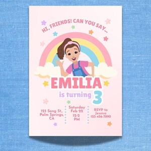 Pastel-themed birthday invitation featuring a cartoon girl inspired by Ms. Rachel, waving with a cheerful expression. The design includes a rainbow, clouds, and colorful stars on a light pink background. The text reads, 'Hi, friends! Can you say…' followed by 'Emilia is turning 3' in bold pink and purple letters. Below, event details such as date, time, location, and RSVP contact are displayed in a playful font. Simply edit, save, and print or share digitally!