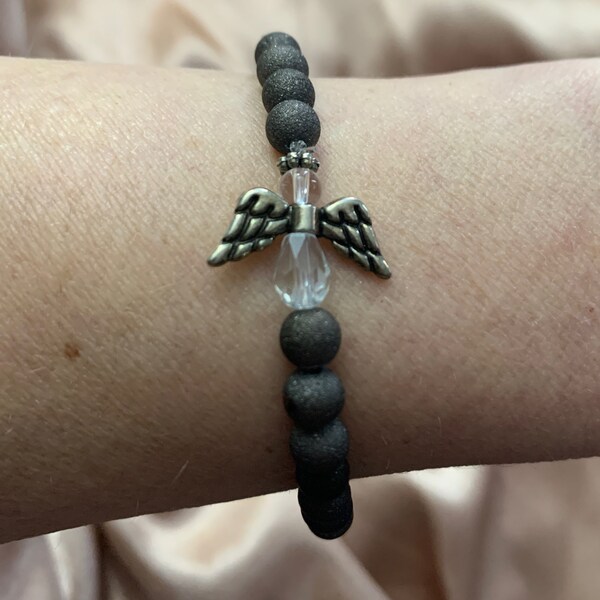 Women or teen angel stretchy dark grey bracelet.