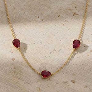 May include: A white ceramic mug with a wraparound design featuring a vibrant, colorful illustration of a toucan bird perched on a branch. The mug has a black handle and a glossy finish.