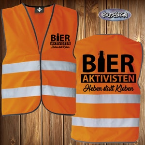 May include: Orange safety vest with reflective stripes and black text that reads "Bier Aktivisten Heben statt Kleben" with a silhouette of a beer bottle.