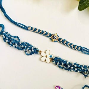 兄弟のための手作りの花と蝶のラキ