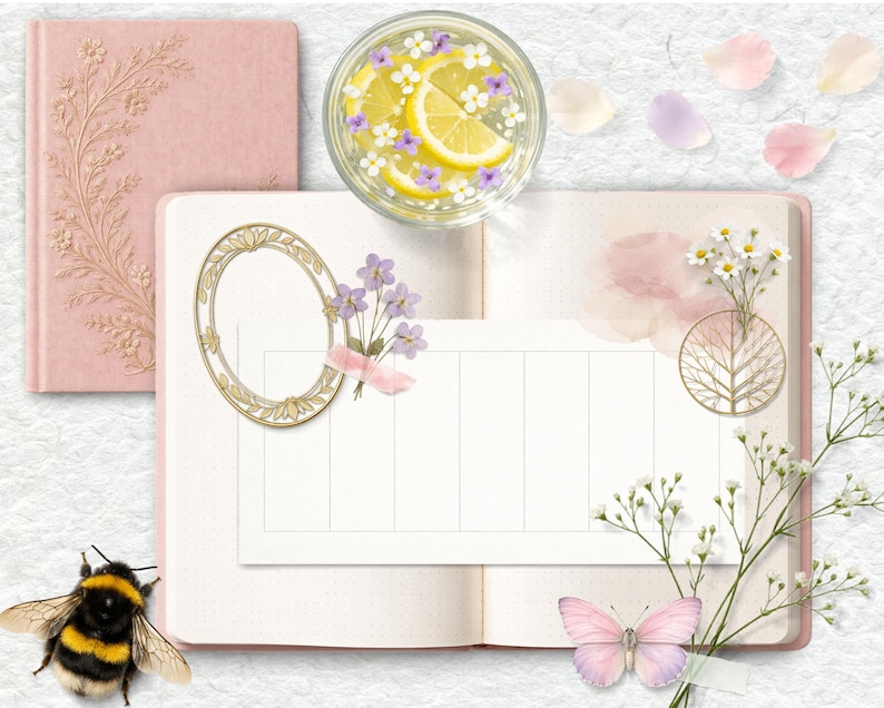May include: A pink journal with floral embossing, open planner with an oval frame, and a glass of water with lemon slices and flowers. A bumblebee and a pink butterfly are also present.