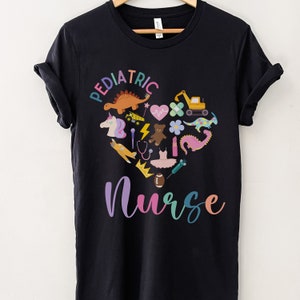 May include: Black t-shirt with a colourful heart design featuring various children's toys and the text "Pediatric Nurse".