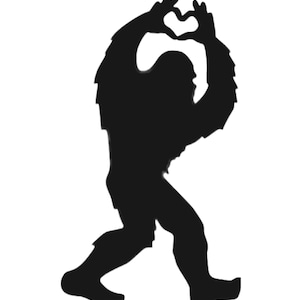 May include: A black silhouette of a Bigfoot making a heart shape with its hands.