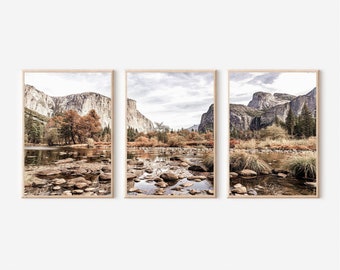 May include: A triptych of landscape photographs featuring a river flowing through a valley with mountains in the background. The river is calm and reflects the sky and mountains. The mountains are rocky and covered in trees. The colors are muted and earthy, with shades of brown, green, and blue.