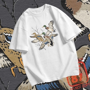 Mallard hunting design PNG with three ducks in flight and detailed feathers, made for duck hunter shirt graphics.