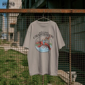 louisiana crawfish design with cowboy riding for funny fishing and cajun themed clothing