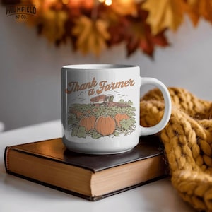 Vintage farm PNG featuring a pumpkin patch scene with orange pumpkins, leafy vines, rolling fields, and a combine harvester under the words “Thank a Farmer.”