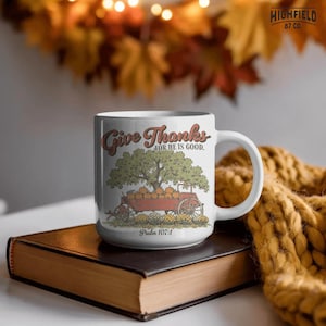 Men faith shirt PNG featuring Give Thanks wording with a harvest wagon full of pumpkins and Christian scripture details.