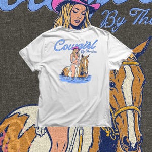 western cowgirl in bikini with horse in ocean, summer beach themed design