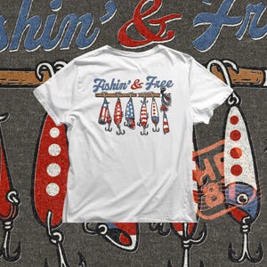 vintage style fishing lure illustration with patriotic red white and blue color scheme and fishin and free text, lures hanging from rod with detailed hooks and fishing gear elements, designed for angler apparel, fishing png for t shirt design, summer outdoor graphic, 4th of july themed fishing design for digital download and print use