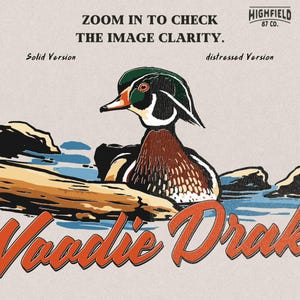 Duck hunting PNG showing a wood duck drake swimming in a pond scene with Woodie Drake text, outdoor hunting artwork