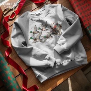 Christmas hunter design with Santa seated in a sleigh pulled by mallard ducks, featuring bold hand-drawn outlines and traditional red, green, gold, and brown colors.