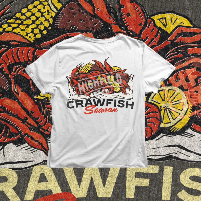 Crawfish boil shirt design PNG displaying detailed red crawfish with yellow corn and sliced lemons arranged in a traditional southern style. Ideal for summer seafood events, Cajun themed parties, and Louisiana inspired shirt printing.