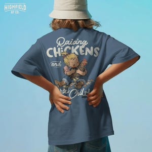 Country life PNG showing a child in jeans holding a brown hen with funny farm family quote lettering.
