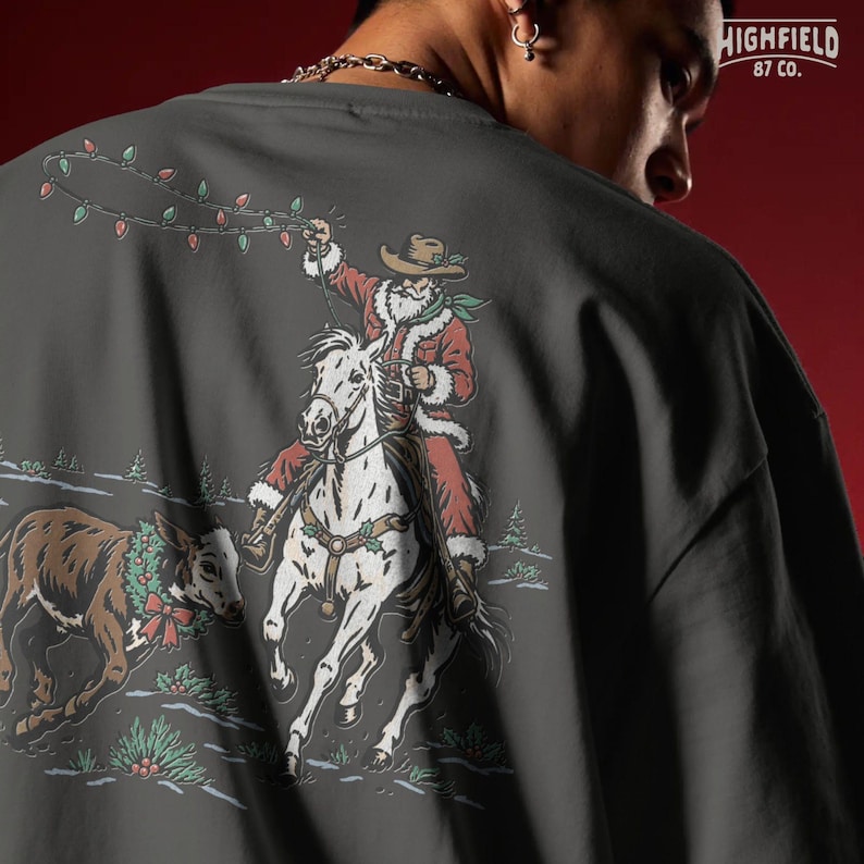 Christmas cowboy PNG featuring Santa in a red fur-trimmed suit riding a white horse while swinging a colorful strand of holiday lights.