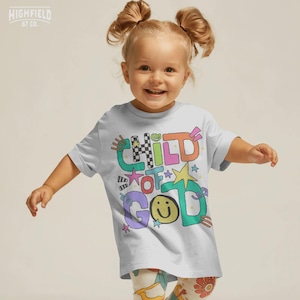 Faith shirt PNG showing bright Child Of God text with cheerful stars and school doodle style for girls and boys apparel.