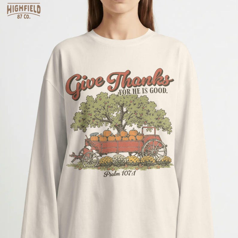 Women faith PNG showing a Christian Thanksgiving design with pumpkin wagon, fall harvest scene, and Psalm 107 1 text.
