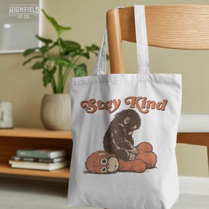 Sad plush toy character under baby monkey, sarcastic cute PNG artwork for Valentine