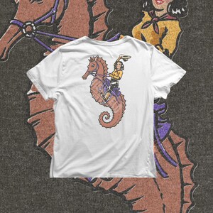 vintage style cowgirl riding seahorse with rope and saddle, beach western artwork