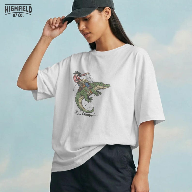 Alligator cowboy PNG with dynamic motion and bold ink lines for western shirt design