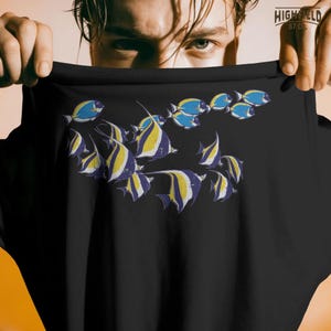 ocean fish png with a school of tropical fish in a coastal style composition, perfect for summer apparel design