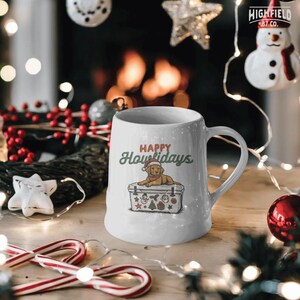 Festive digital dog art of labrador laying on cooler with Xmas decor. Includes “Happy Howlidays” phrase for sublimation and Christmas PNG downloads.