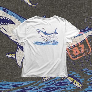 shark jump png with water splash and bait fish, action marine life illustration for beach apparel