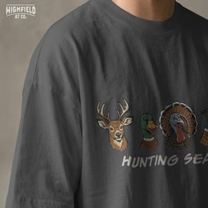 Hunter shirt PNG showing deer, duck, turkey, pheasant, and wild boar heads in a clean outdoor hunting season layout.