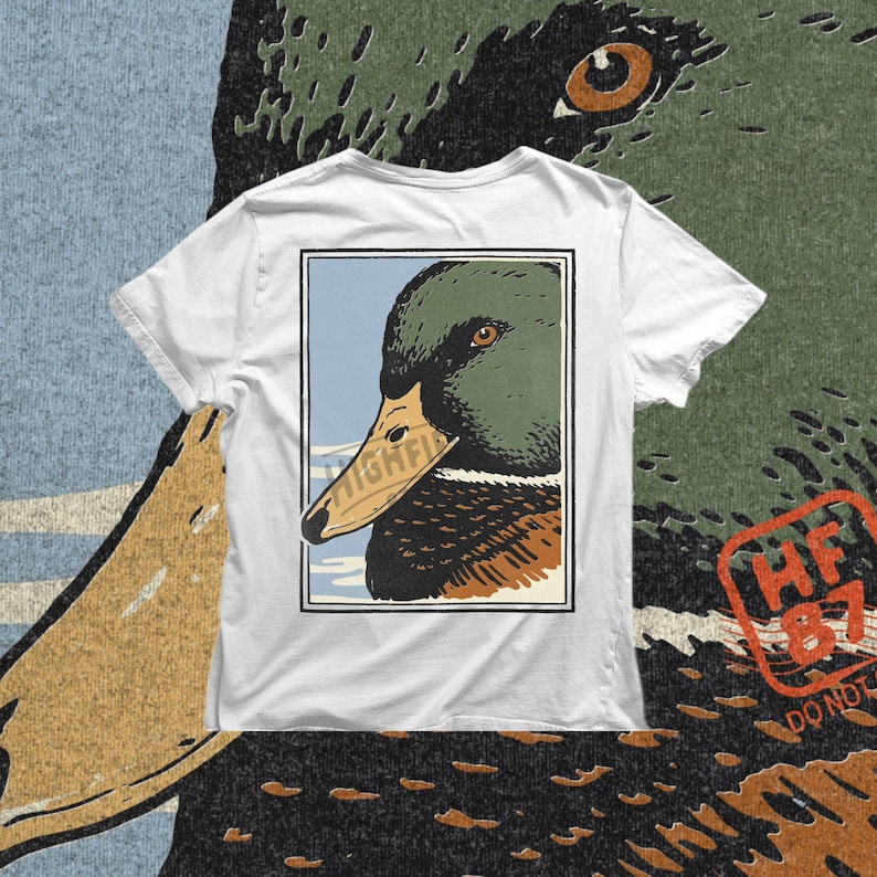 Vintage inspired mallard drake portrait featuring a strong side profile with green head feathers, smooth yellow bill, and rich brown chest markings. The illustration uses flat solid colors and bold outlines for a clean print ready PNG file. Ideal for duck hunting shirt graphics, waterfowl apparel design, and wildlife themed digital download projects.