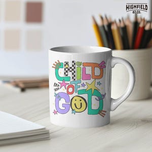 Student shirt PNG showing a cheerful Christian kids design with Child Of God lettering, smiley face, stars, and doodles.
