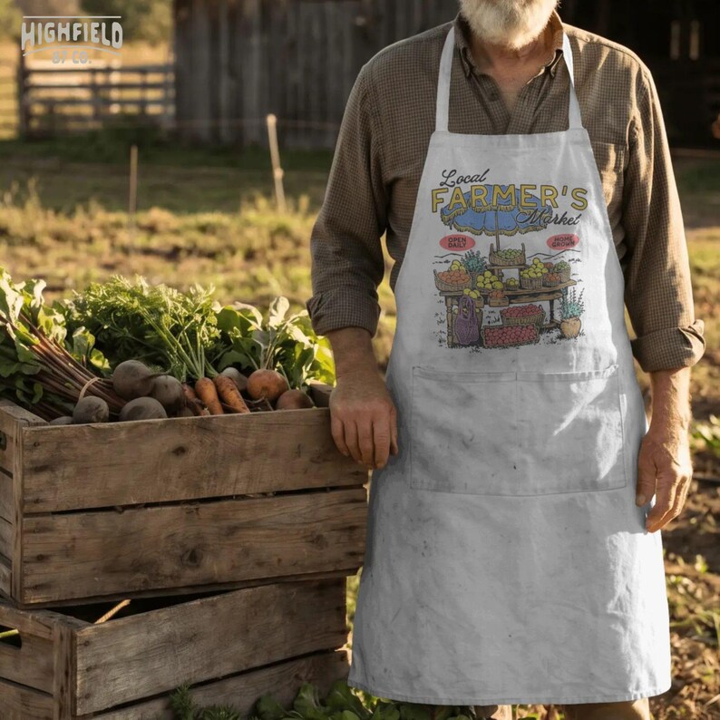 Farm life PNG showing a farmers market table with fruit baskets, potted herbs, net bag, and homegrown produce theme for country shirt designs.