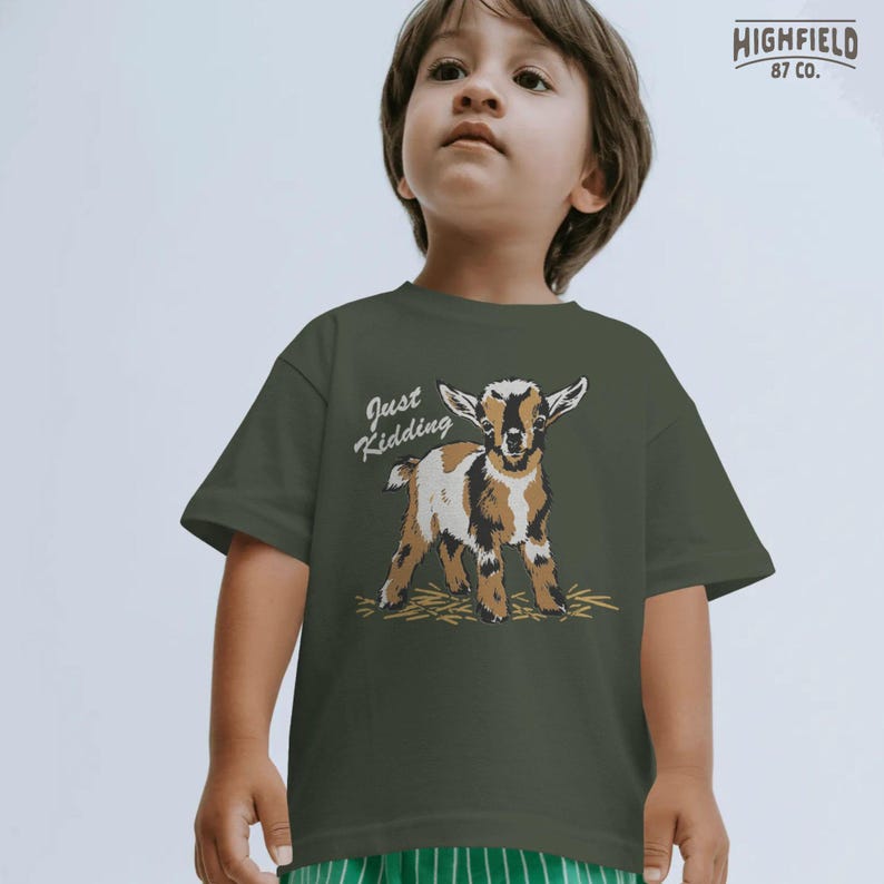 Goat shirt design PNG featuring a young goat in a hand drawn style with hay beneath its feet and a funny pun caption for farm animal lovers.