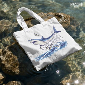 summer ocean png with shark and fish in action scene, bold coastal shirt graphic