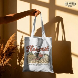 Farmer gift PNG showing a Christian farming harvest design with combine harvester and scripture inspired wording.