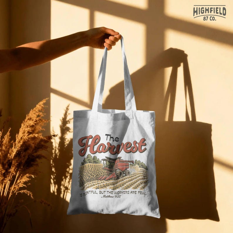 Farmer gift PNG showing a Christian farming harvest design with combine harvester and scripture inspired wording.