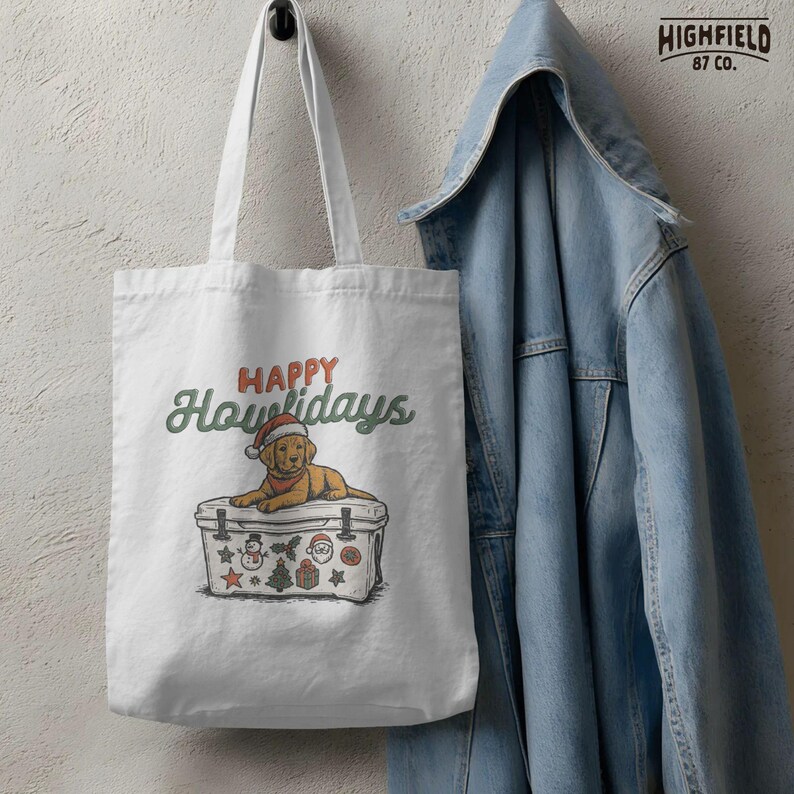 Labrador dog Christmas art with Santa hat and “Happy Howlidays” lettering. Perfect for funny pet lover apparel and winter sublimation projects.