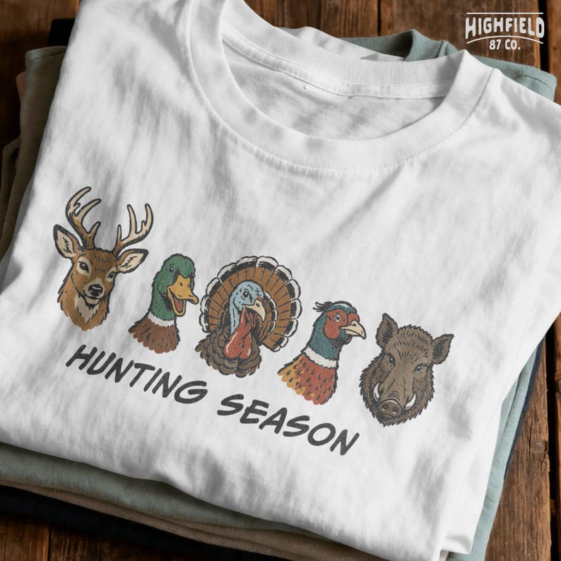Fall hunting PNG with five popular game animals including whitetail deer, mallard duck, turkey, pheasant, and boar.