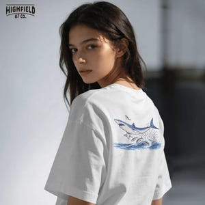 ocean animal png with shark and bait fish in motion, bold summer marine design