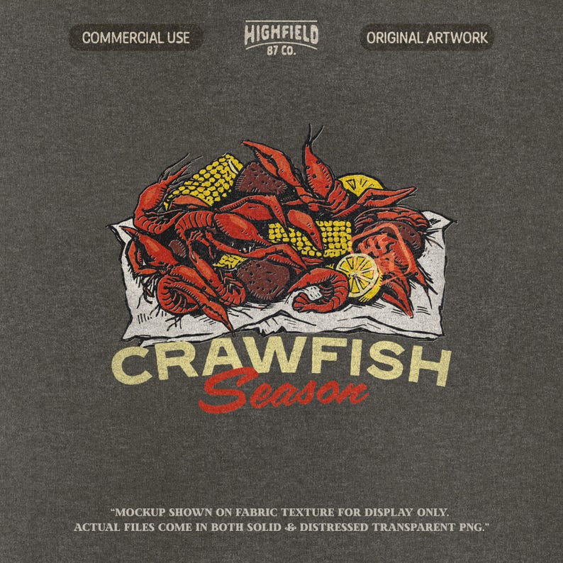 Louisiana seafood boil design showing cooked crawfish stacked with corn and fresh lemon wedges on a rustic paper surface. The bold Crawfish Season text appears below the food illustration, making it perfect for summer crawfish party shirts and seafood festival apparel.