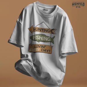 Hunting fishing shirt design PNG showing hanging wooden signs with arrows and fish shapes