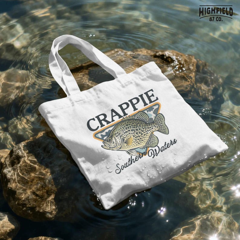 Panfish fishing PNG with a crappie fish illustration, camo background, and southern waters text for freshwater fishing shirt design projects.