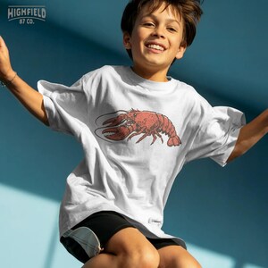 southern seafood shirt design with crawfish and slogan, pocket and back layout PNG